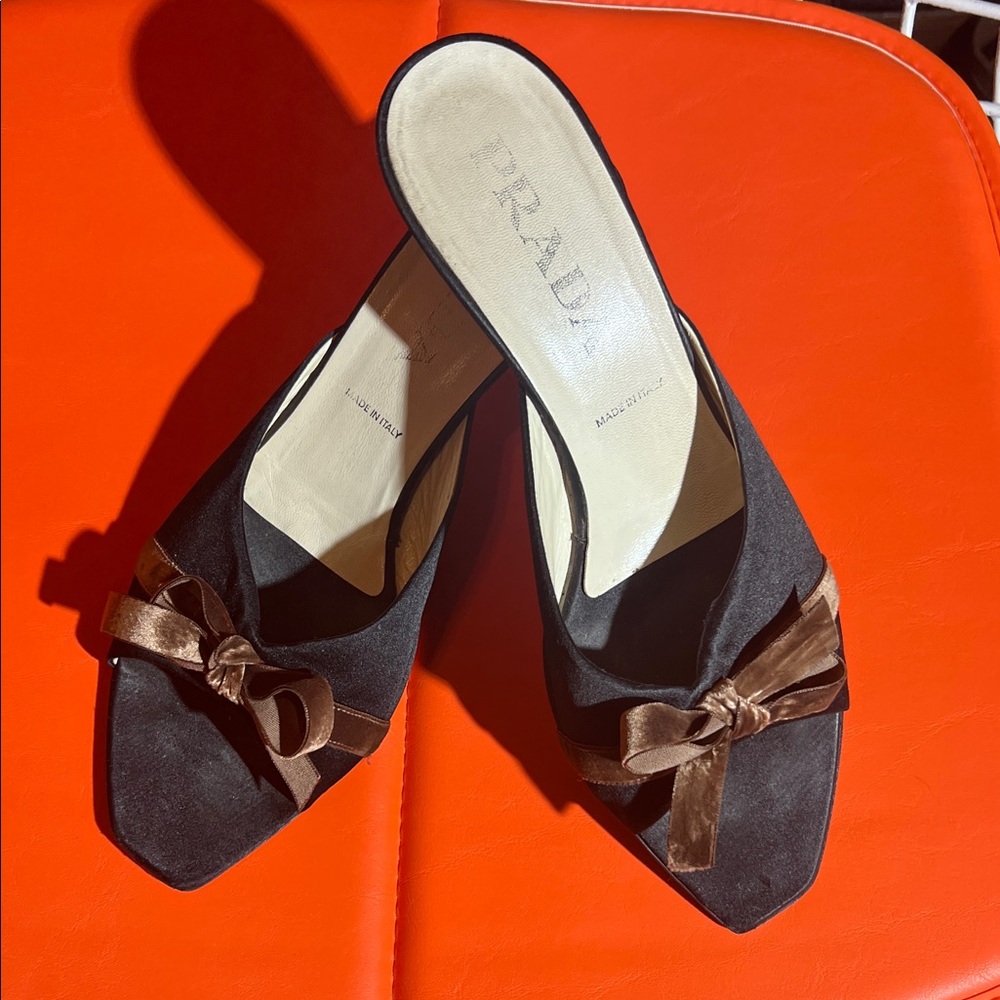 Prada Elegant Black Suede Mules with Brown Bow